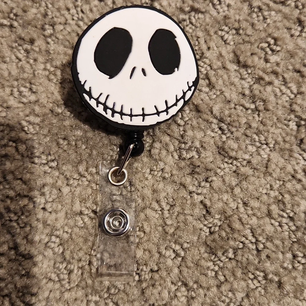 NIGHTMARE BEFORE CHRISTMAS Black and White Skull Badge Reel
